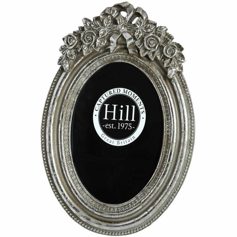 Oval photo frame with antique silver effect finish with ribbon bow detail