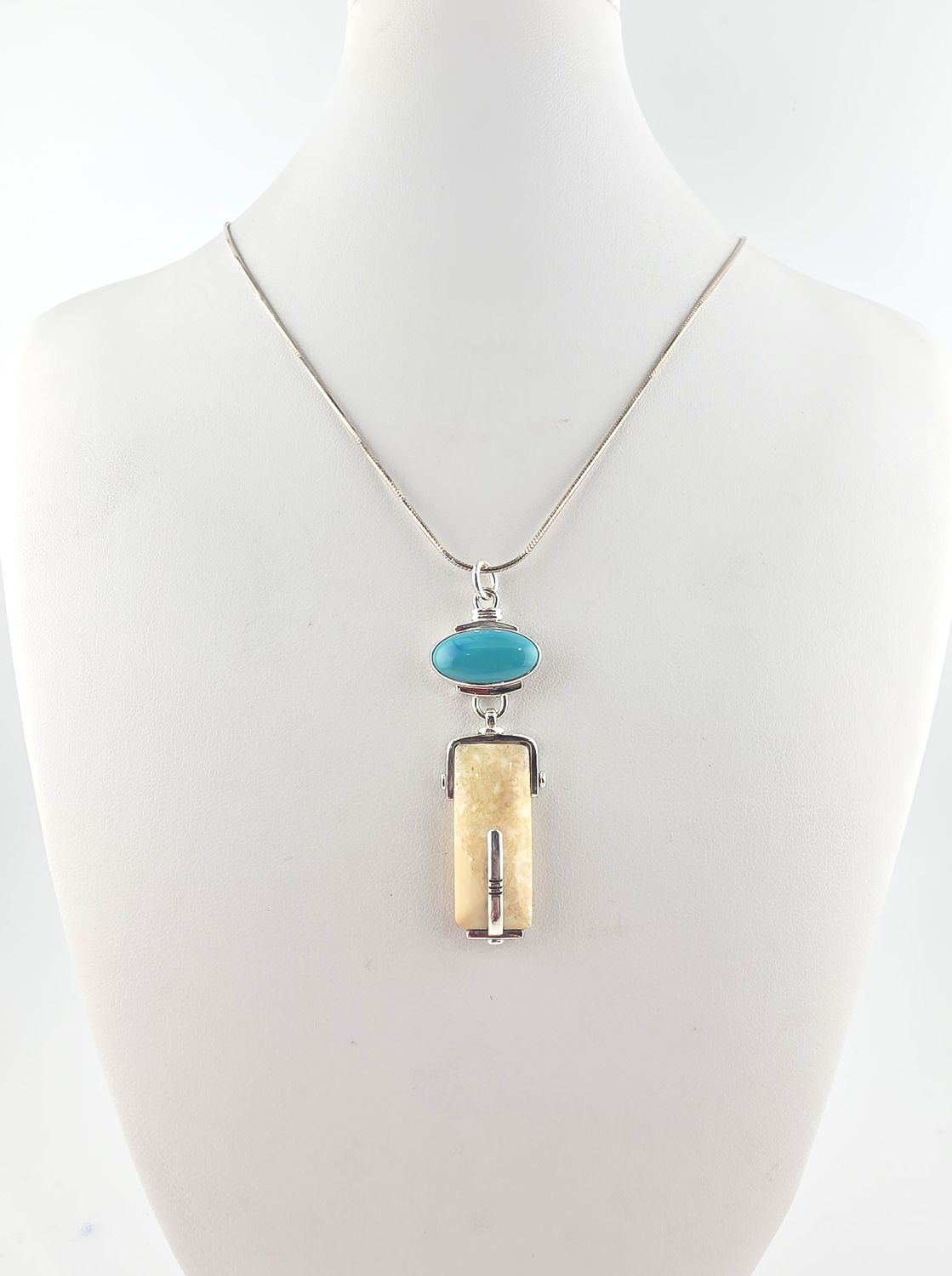 Fossilized Walrus and Turquoise Pendant