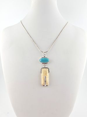 Fossilized Walrus and Turquoise Pendant