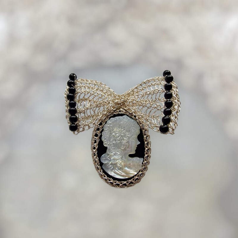 10 Silver Brooch &quot;My Lady&quot; with  black agate and mother of pearl cameo hand CroShaped© in signature wire pattern.