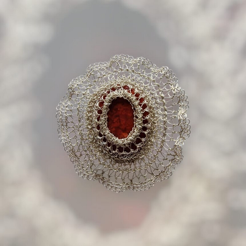 10 Silver Brooch &quot;Vera&quot; with pressed red coral and garnet hand CroShaped© in distinctive wire pattern.