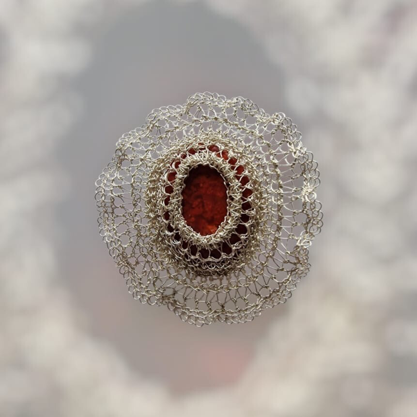 Silver Brooch &quot;Vera&quot; with pressed red coral and garnet hand CroShaped© in distinctive wire pattern.