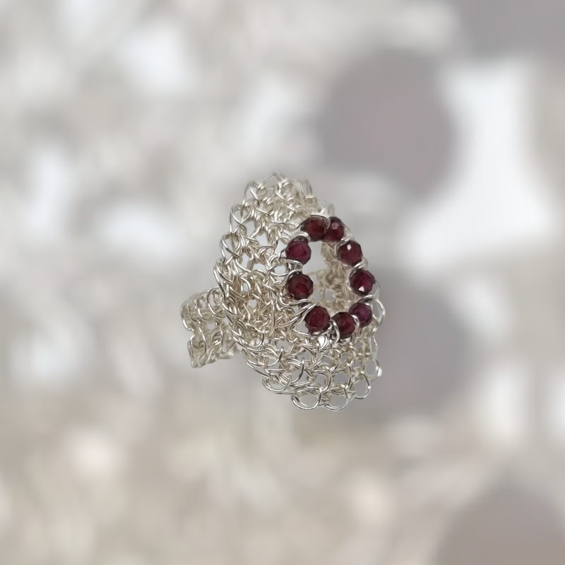 Silver Ring &quot;Oneline Garnet&quot; hand CroShaped© in signature wire pattern.