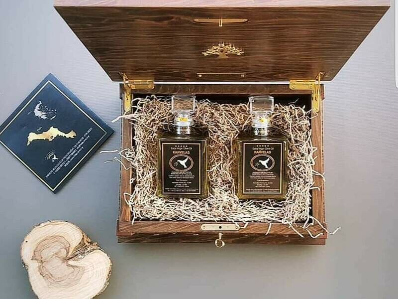200 ml two bottles and it is also available inside olive wooden gift box
