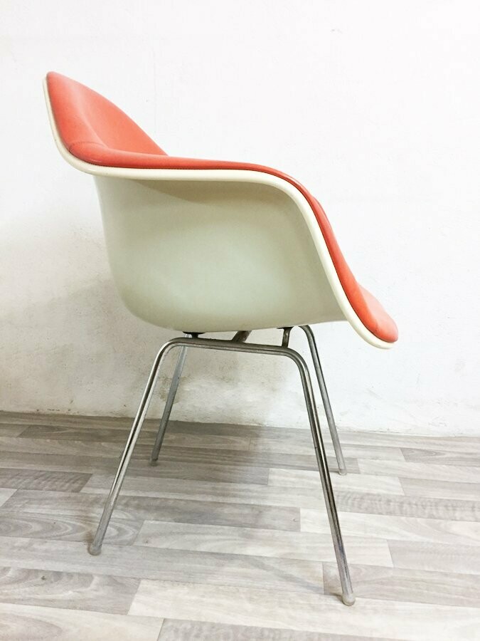 Fauteuil Eames orange cuir vintage, 1960
