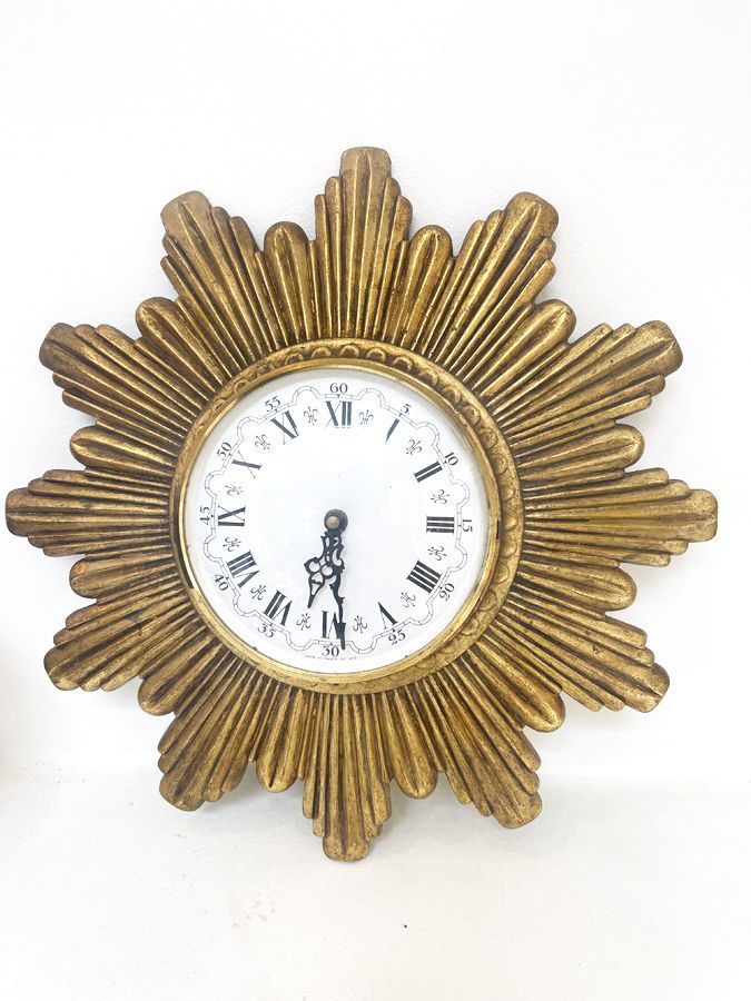 Horloge vedette forme soleil, 1960