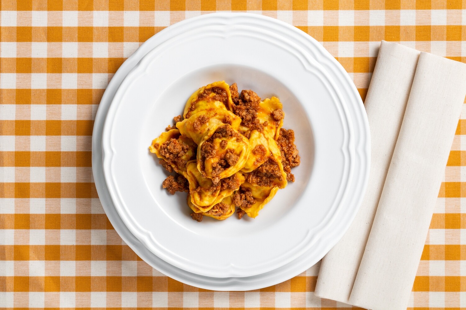 Tortelli di zucca al ragù Tortelli di zucca al ragù