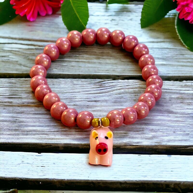 Glücksbringer - Wunderperlenarmband mit Schweinchen in rosa -  Mini