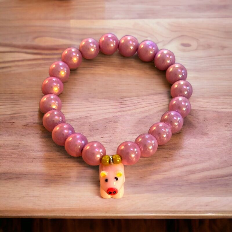 Glücksbringer - Wunderperlenarmband mit Schweinchen in rosa -  Midi