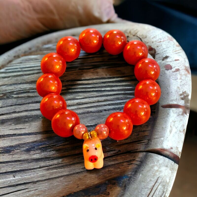 Glücksbringer - Wunderperlenarmband mit Schweinchen in rosa -  Large