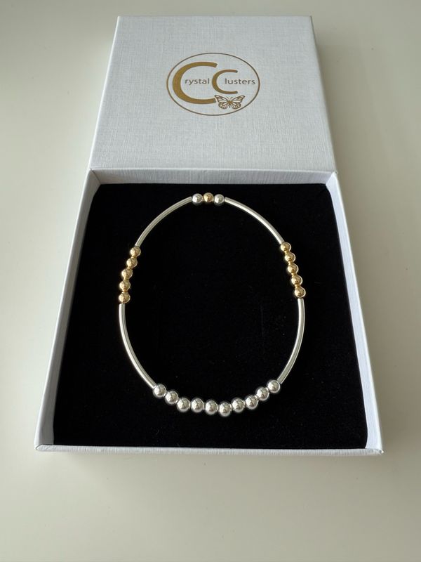 Sterling Silver And Gold Beaded Stretchy Bracelet