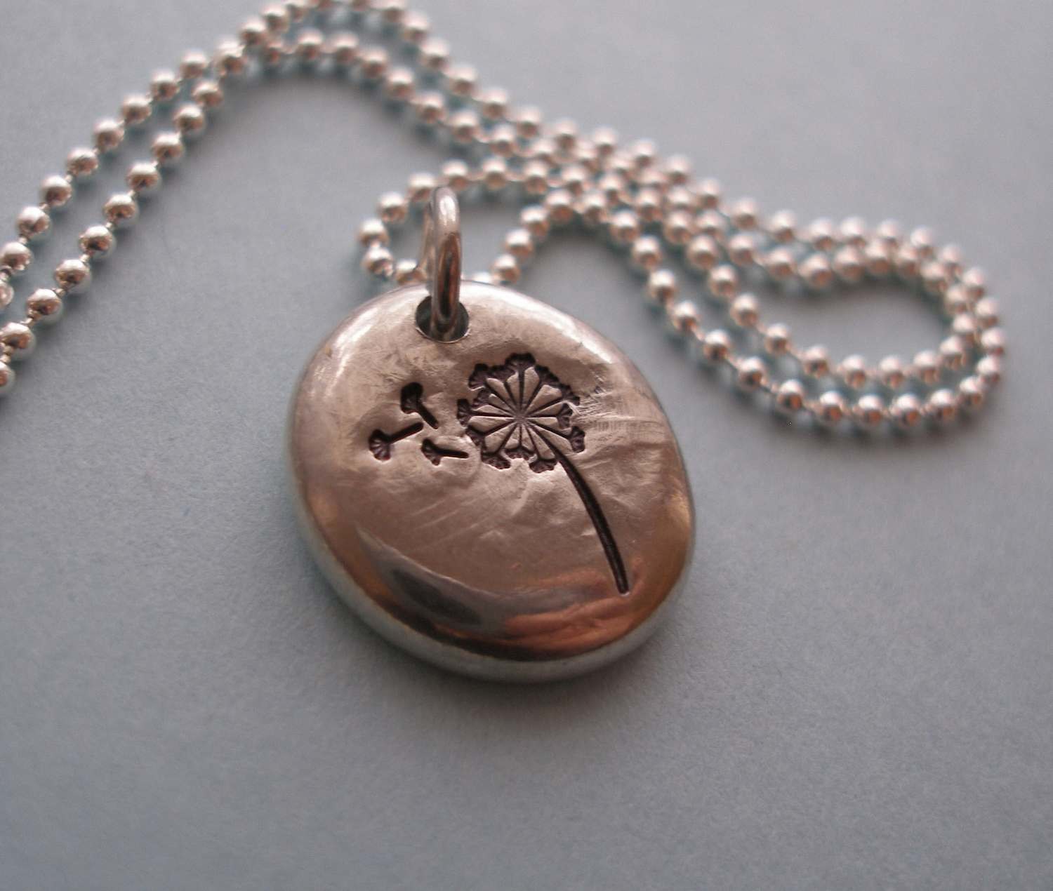 dandelion &amp; fluff on pewter