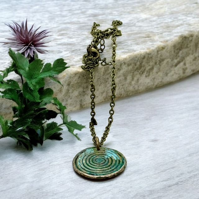 Pictish bronze spiral pendant