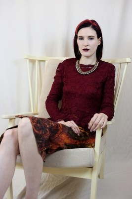 Yasmin -  Round Neck Peplum Blouse