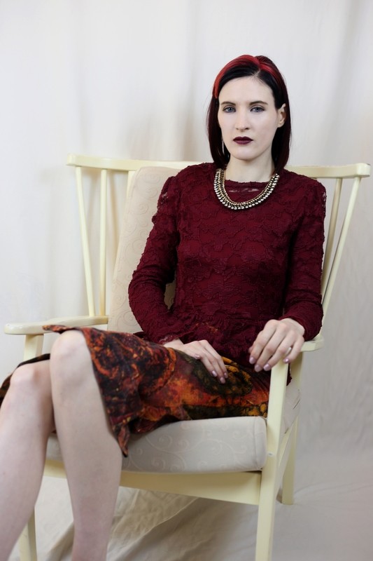 Yasmin -  Round Neck Peplum Blouse