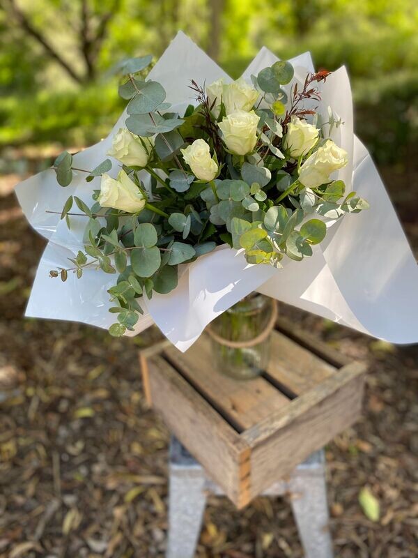 White Roses in Glass Vase