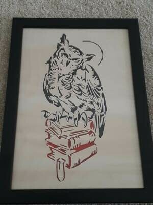 Owl Sitting on Books