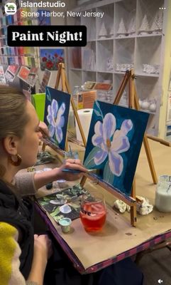 Paint and Sip Stone Harbor NJ, private paint party Stone Harbor at Island Studio, guests paint a flower in Island Studio
