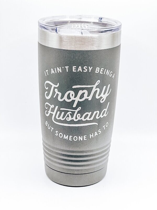 It ain't easy being a trophy husband