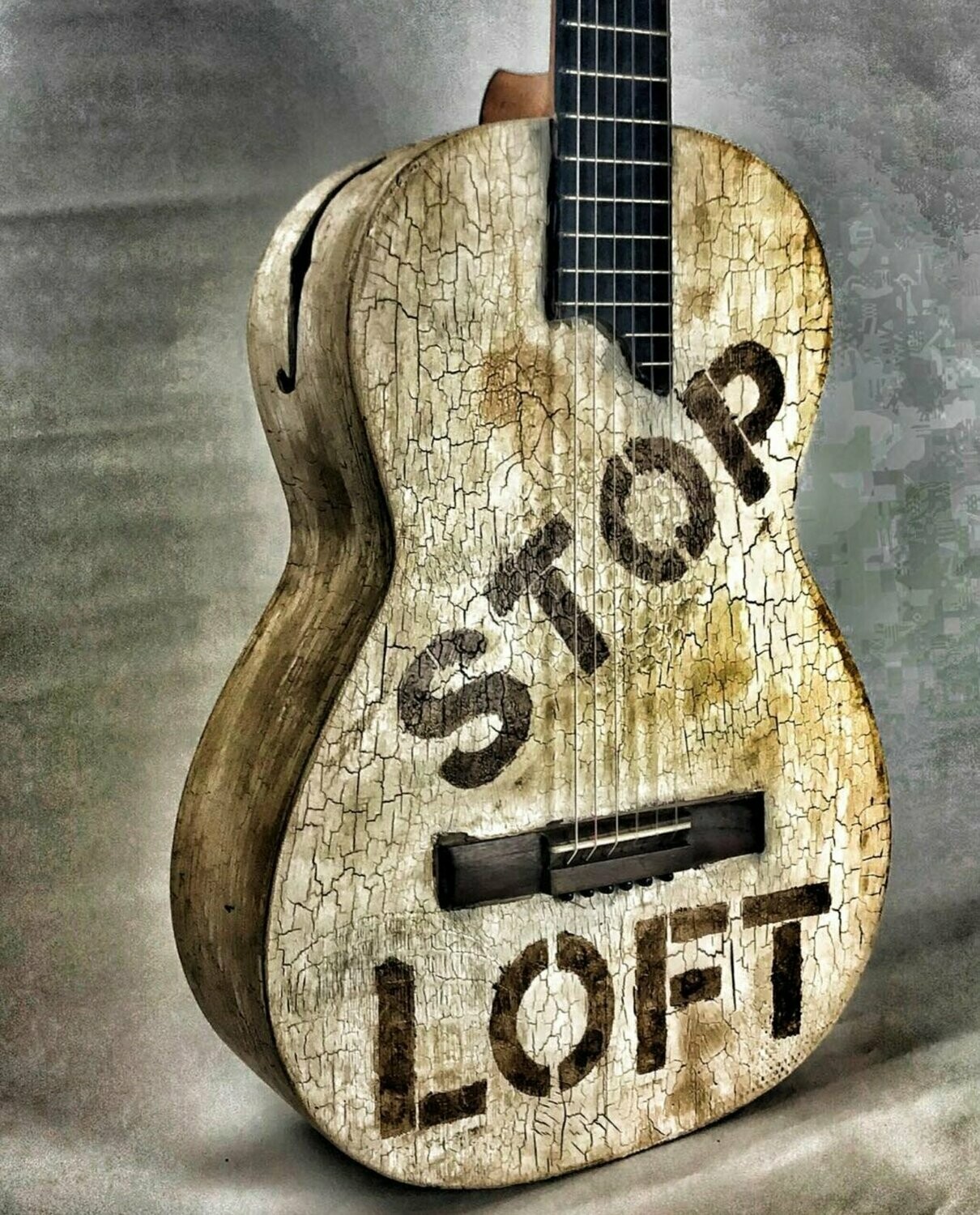 Guitarra artesana pintada cuarteada stop loft