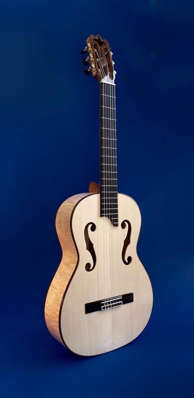 Guitarra artesana hecha a mano violín Guitarra artesana hecha a mano violín