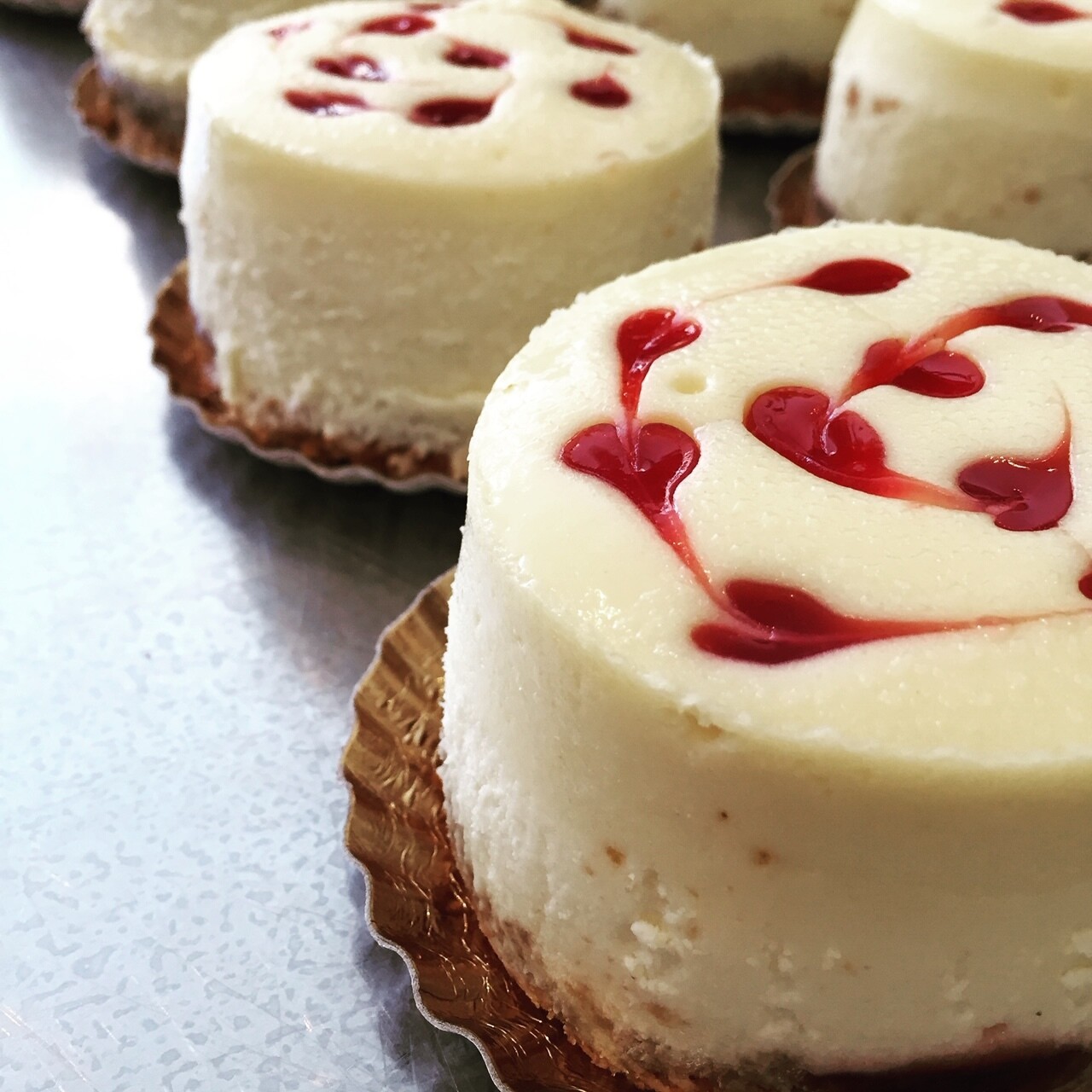 Raspberry Swirl Cheesecakes  | 1/2 dz
