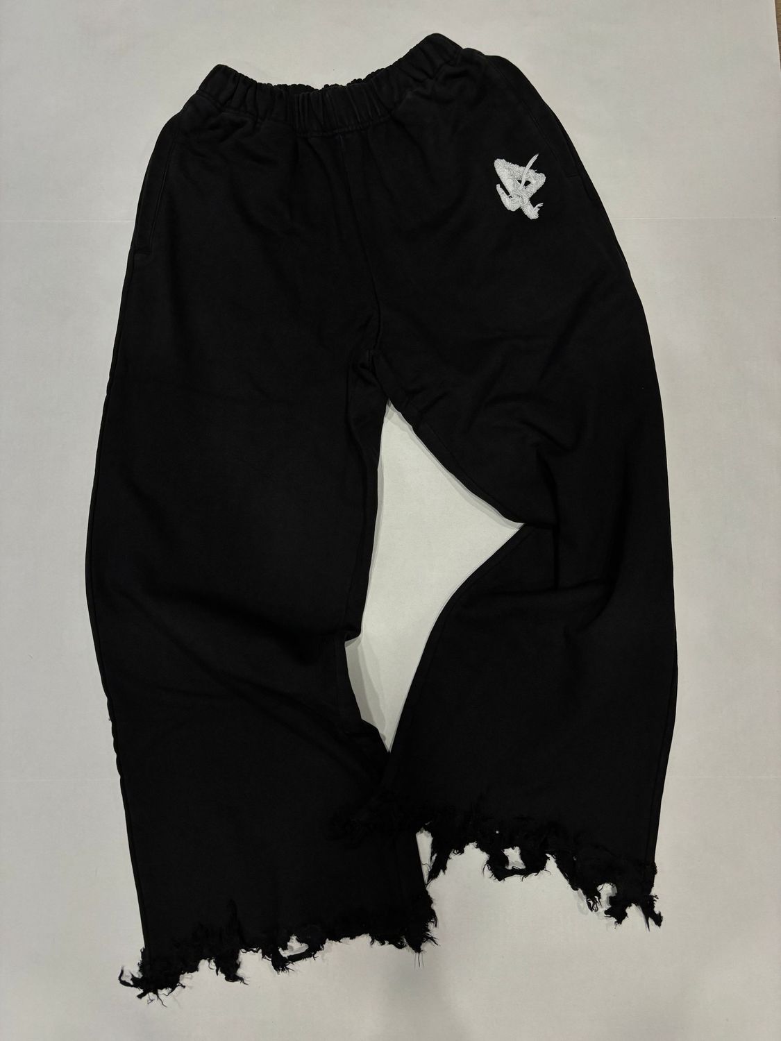Cotè Flared Rip Pants