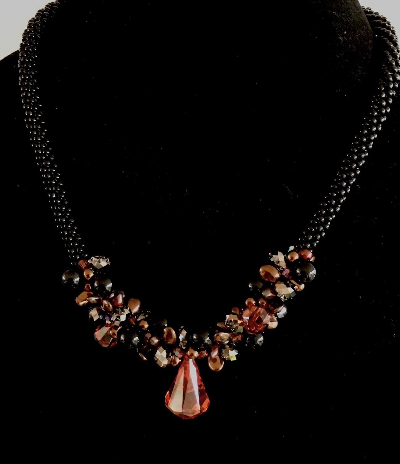 Black and orange Kumihumo necklace ( with faceted crystal pendant)