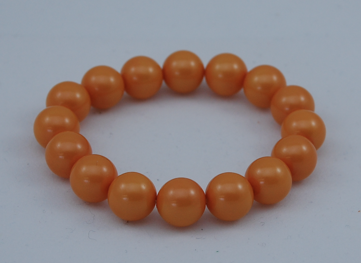 Oranje bolletjesarmband