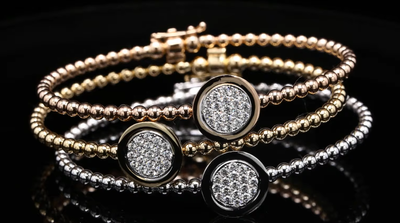 18 Kt geel/wit/roségouden armband
