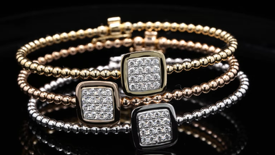 18 Kt geel/wit/roségouden armband