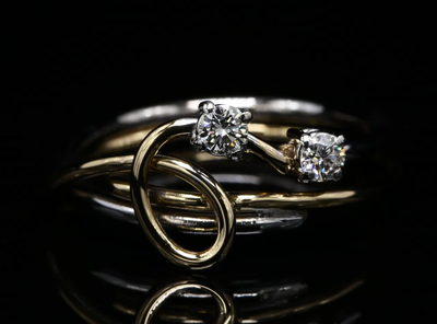 18 Kt bicolor geel/witgouden ring