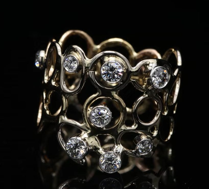 18 Kt bicolor geel/witgouden ring