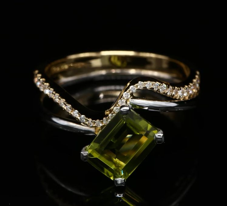 18 Kt bicolor geel/witgouden ring