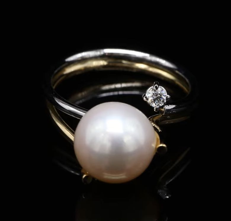 18 Kt bicolor geel/witgouden ring