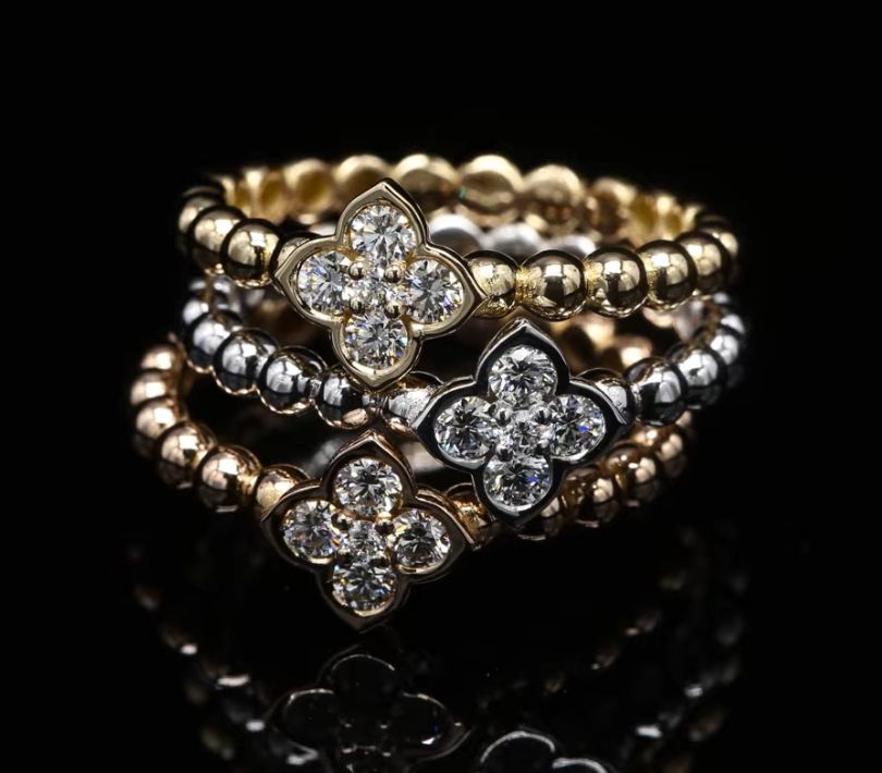 18 Kt wit - geel - roségouden ring