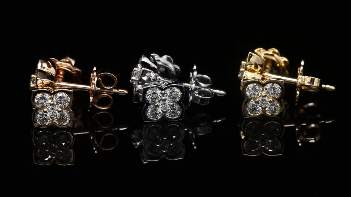 18 Kt geel - wit - roségouden oorbellen