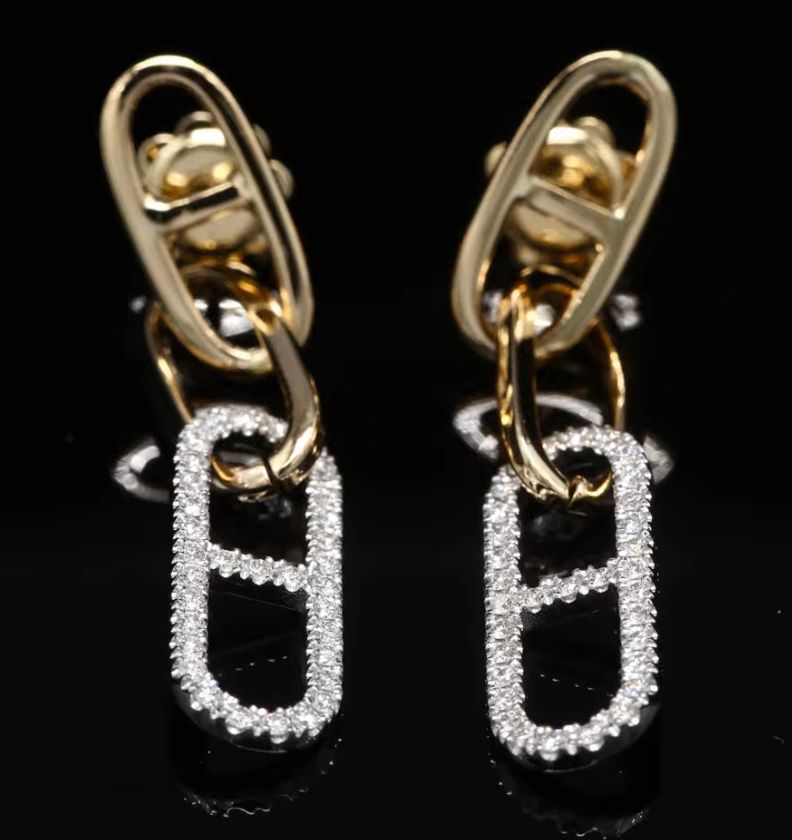 18 Kt bicolor geel/witgouden oorbellen