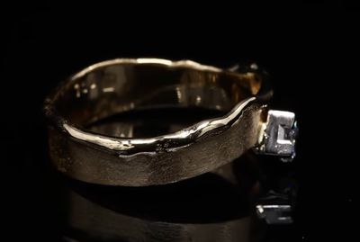 18 Kt bicolor geel/witgouden ring