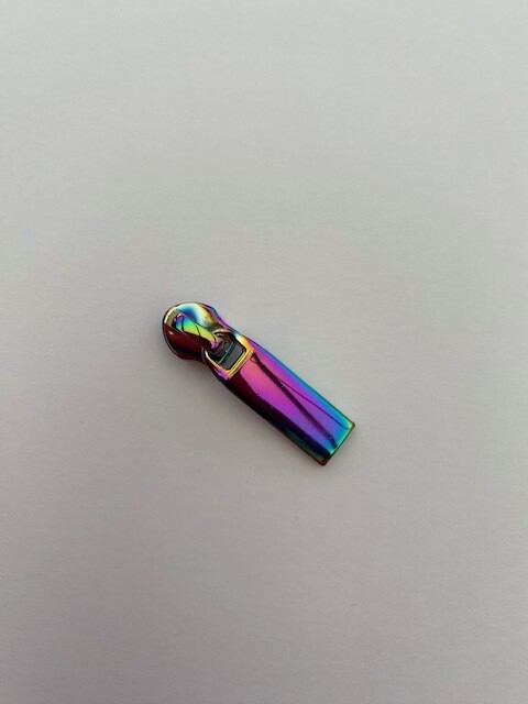 Ritstrekker in regenboogkleuren, plat