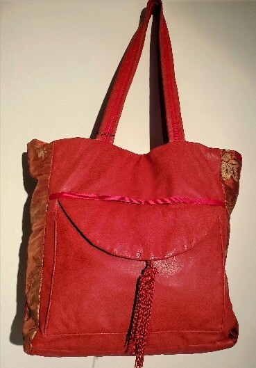 Red leather tote bag.