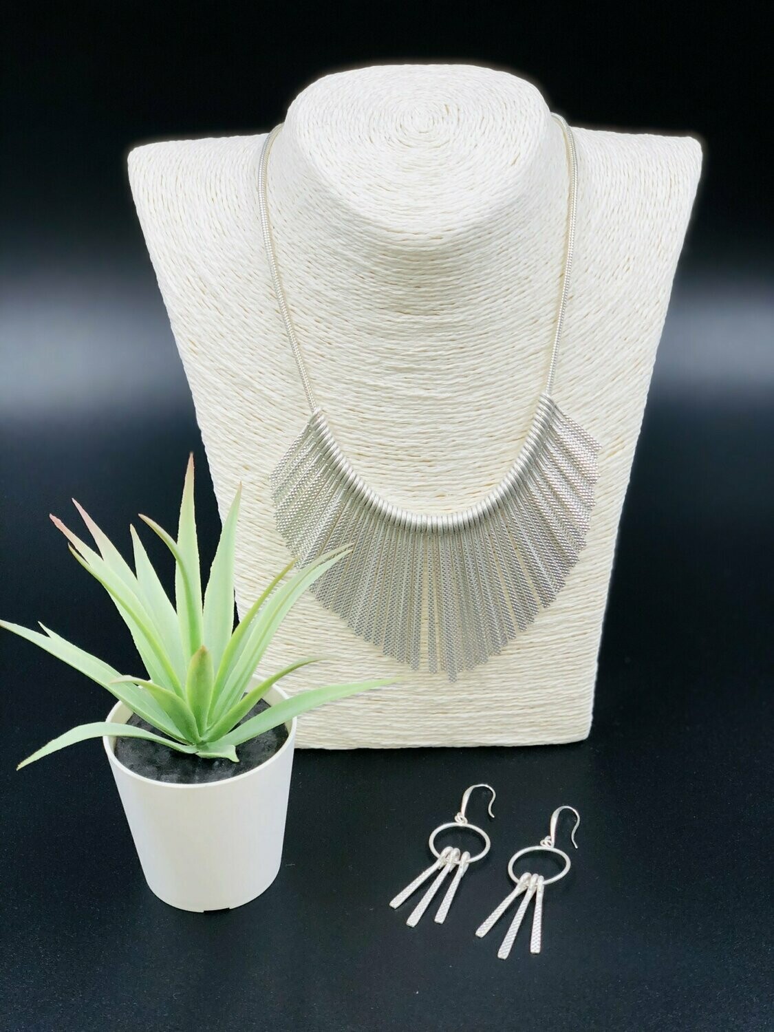 Silver necklace and earring set