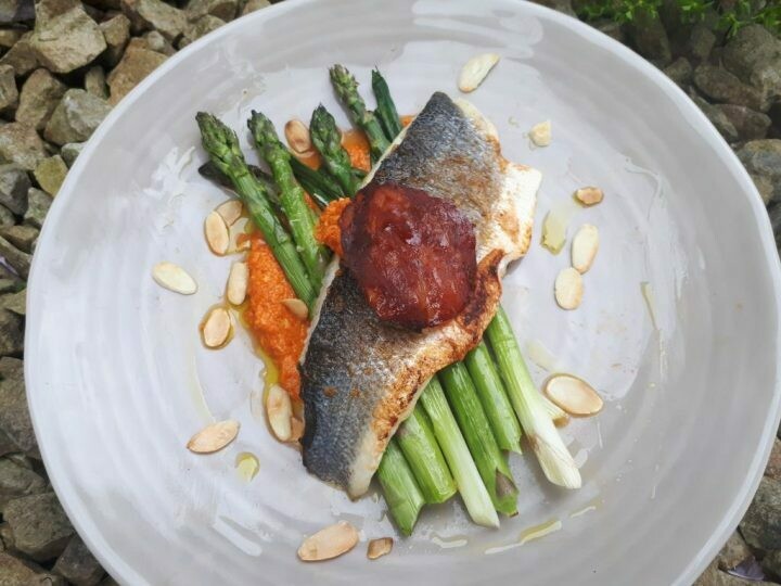 スズキとロメスコソース、アスパラとバジルオイル、グリルポレンタ添え Sea Bass with Romesco and Asparagus in Basil Oil and Grilled Polenta
