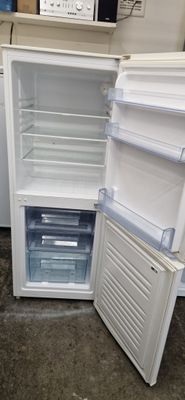 TESCO FRIDGE FREEZER 141 CM TALL, 55 CM&nbsp;MODEL FW55145