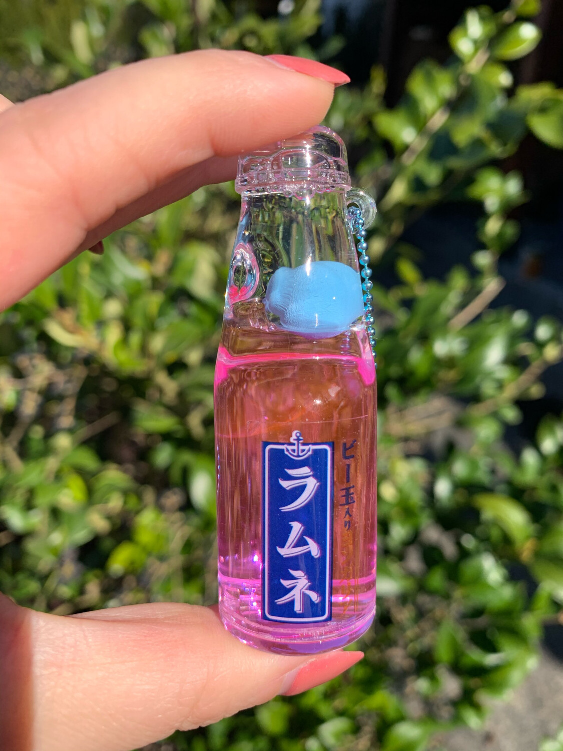 Pukapuka Ramune Oil Mascot Keychain (Pink)