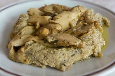 Polenta con fonduta di formaggi e funghi