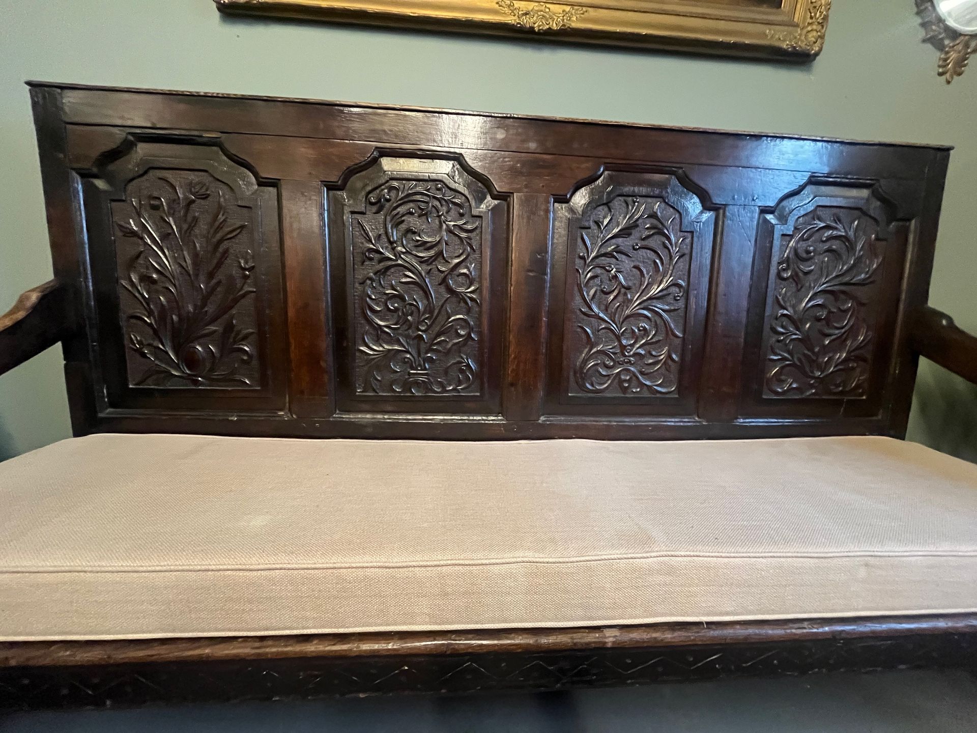 18th century and later carved Oak settle.