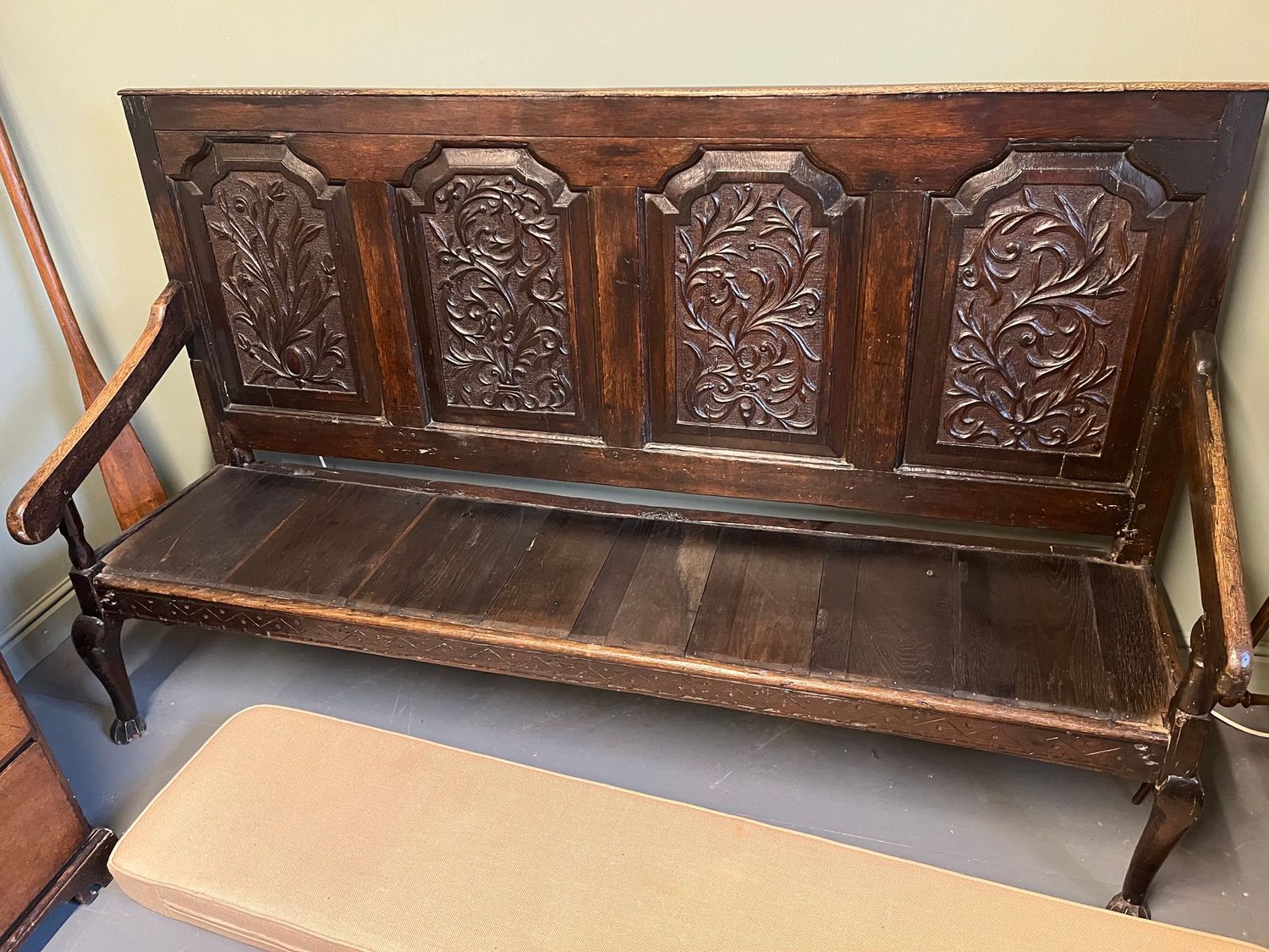 18th century and later carved Oak settle.