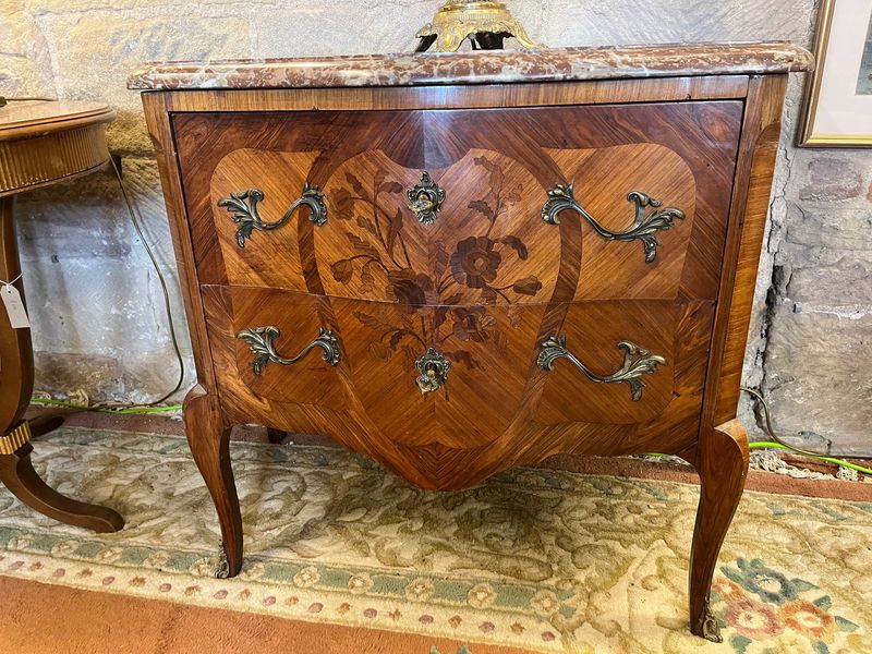 Louis XV-style marquetry commode. Louis XV-style marquetry commode.