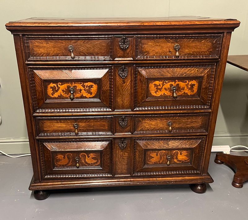 19th-century oak and marquetry geometric chest of drawers